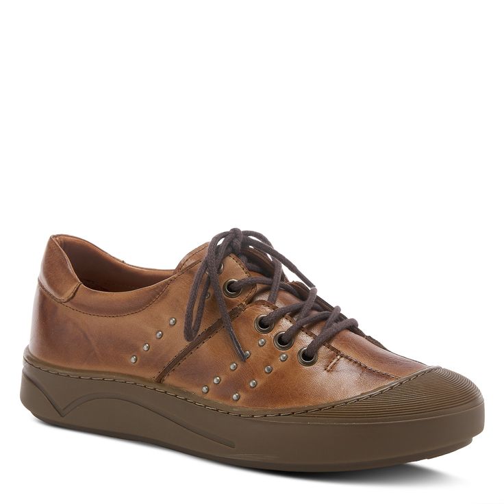 Footwear with rubber, plastic, leather soles and textile uppers